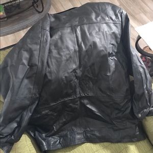 Leather jacket with drawstring ability.